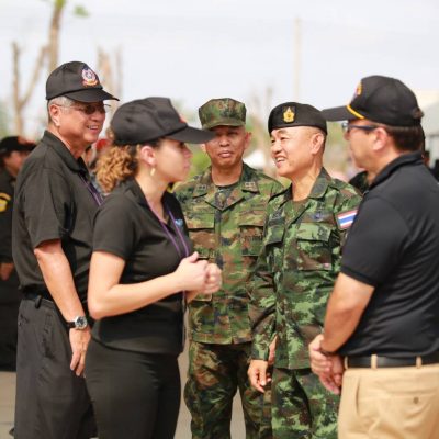 3 members of Potter leadership team happily interacting with 2 Thai military officers during Cobra Gold exercise
